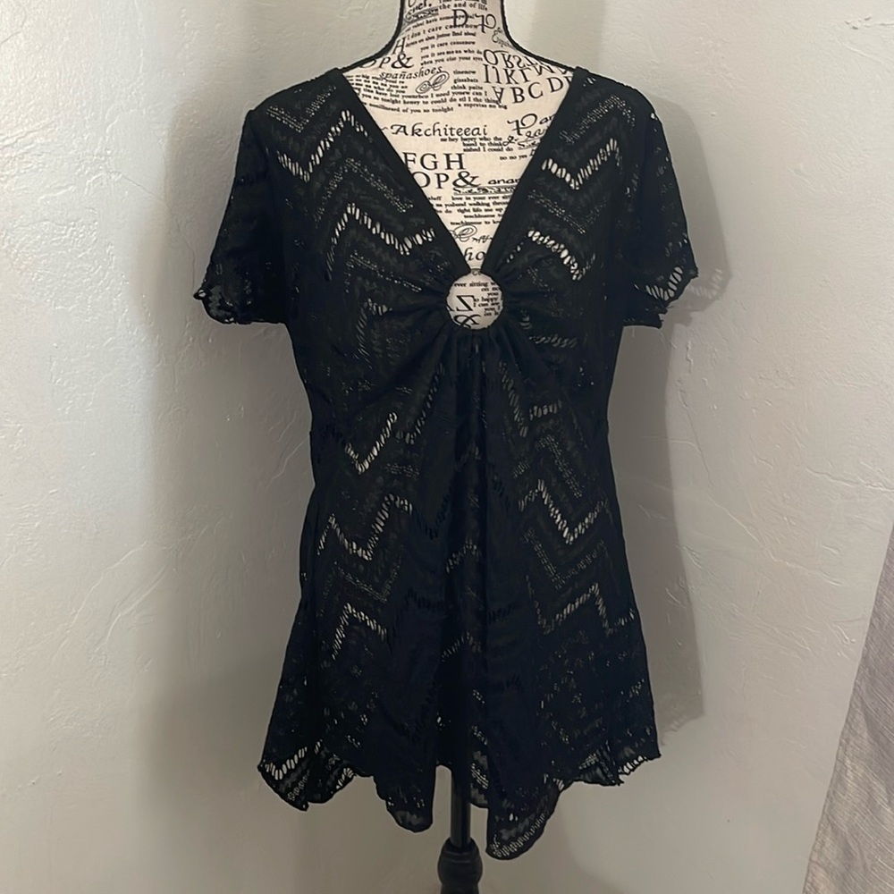 Rue21 Black  lace top. Would look cute over a Black bra or bathing suit